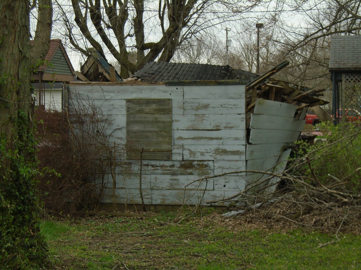 Old detached wooden garage before removal